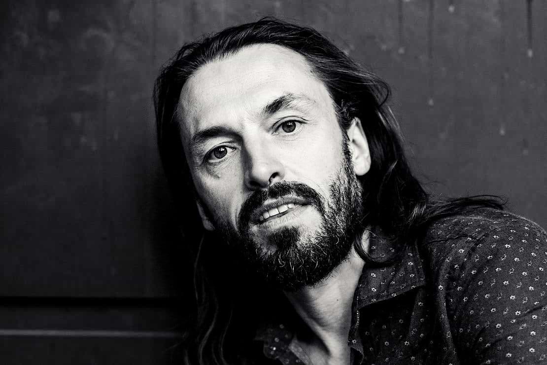 Black-and-white press portrait of Markus Sieber, the person behind Aukai