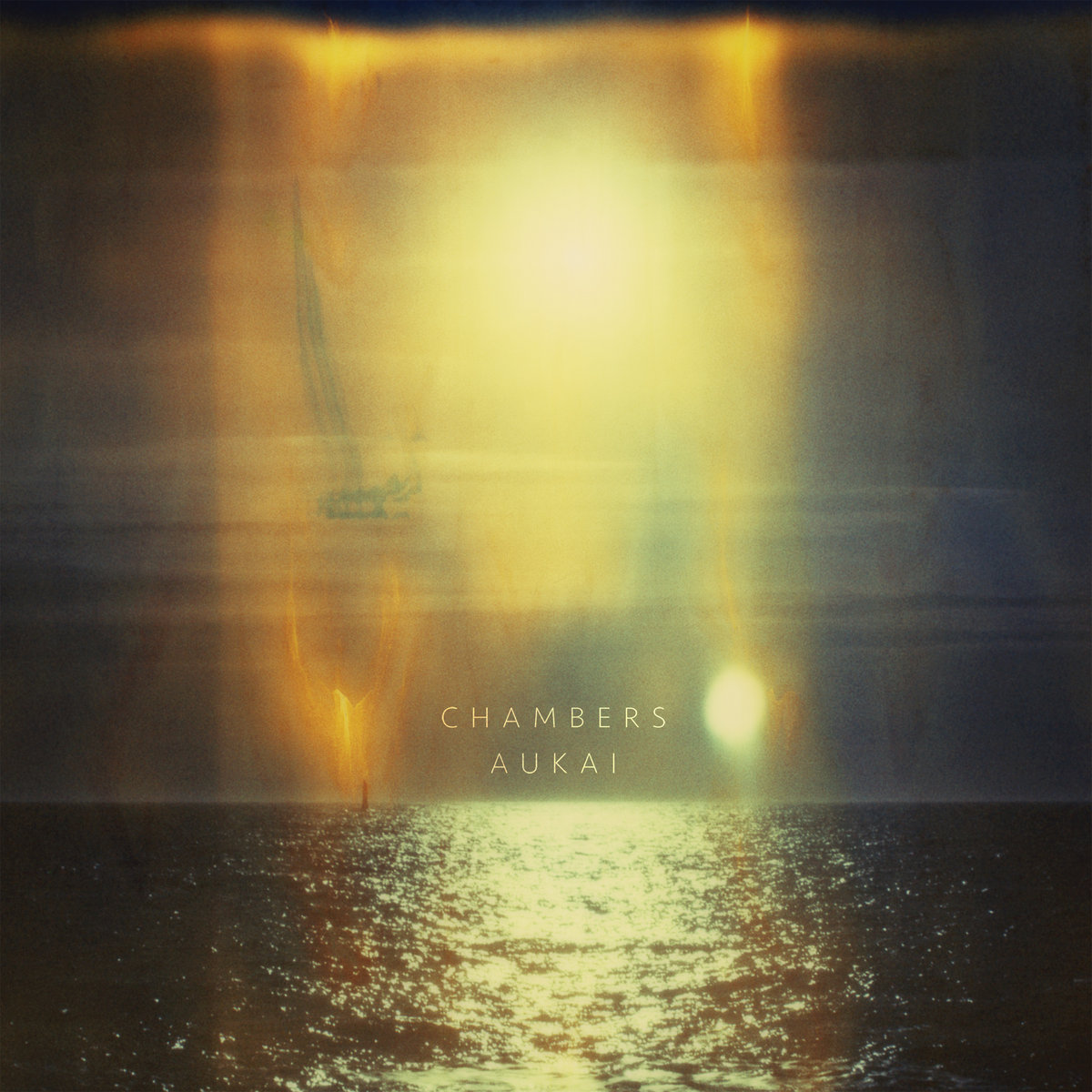 Chambers album cover — a blurred, sun-flared photograph of light over water, with a faint sailboat, titled CHAMBERS / AUKAI