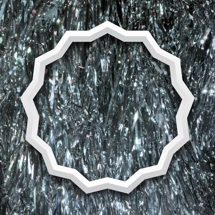 Island Universe Story: Selected Works cover — a white twelve-pointed ring over a field of silver tinsel