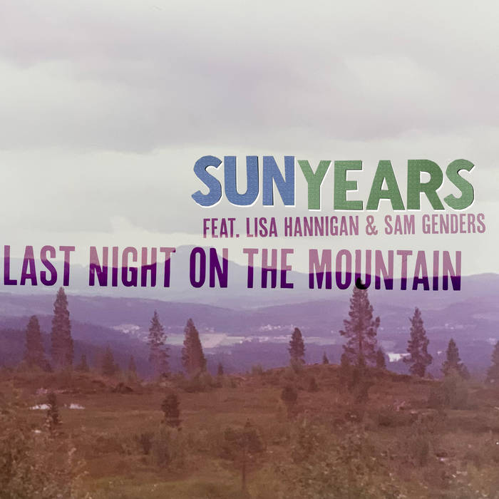 Single artwork: a hazy mountain valley of pines under an overcast sky, with the titles SunYears feat. Lisa Hannigan and Sam Genders — Last Night On The Mountain
